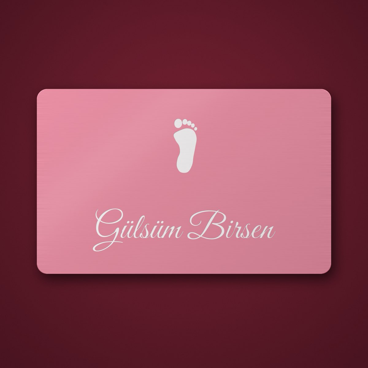FD Diamond pink anodised aluminium baby shower card, back: Gülsüm Birsen, right footprint (design illustration)